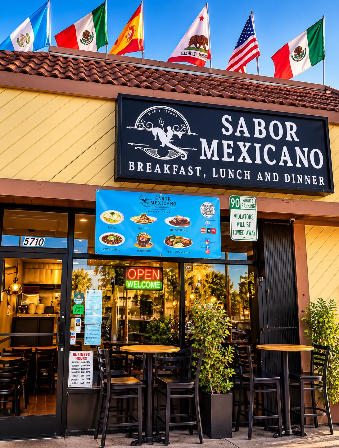 Fachada de día con el letrero Sabor Mexicano, el número 5710 y mesas afuera